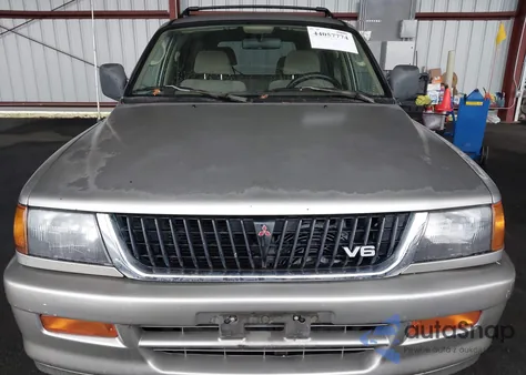 1999 Mitsubishi Montero Sport Ls/Xls z USA, uszkodzony, nr VIN JA4MT31H4XP032685